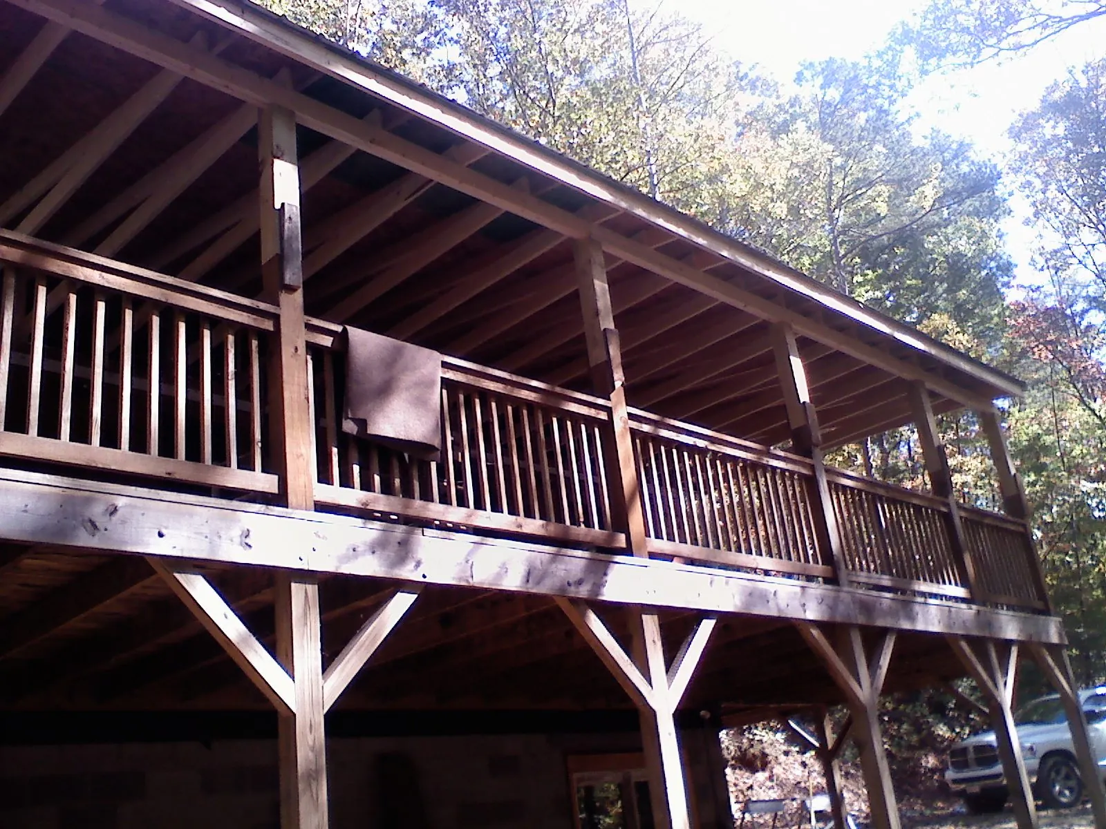Timber framing under a new elevated porch and deck — Roof Leak Repair in Breaux Bridge by Roofing Brothers